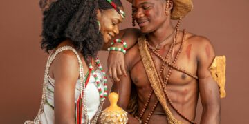 couple wearing promise rings