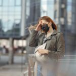 woman wearing black leather mini skirt