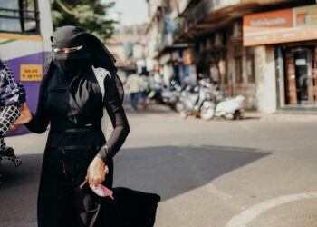 woman wearing sequin pants street style